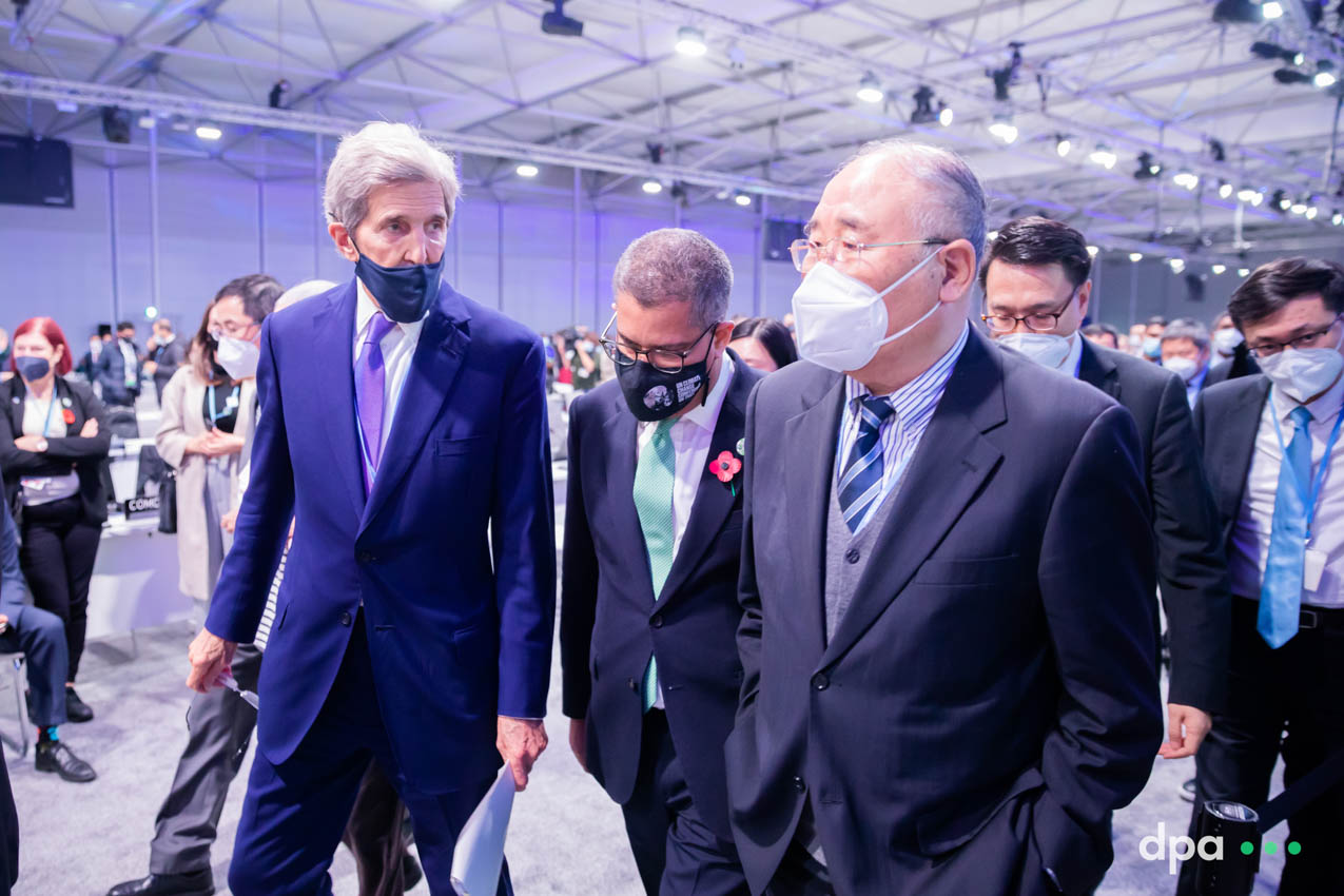 United States Special Presidential Envoy for Climate John Kerry (l-r), President of the COP26 summit Alok Sharma and  China's Special Envoy for Climate Change and Chief Negotiator Xie Zhenhua