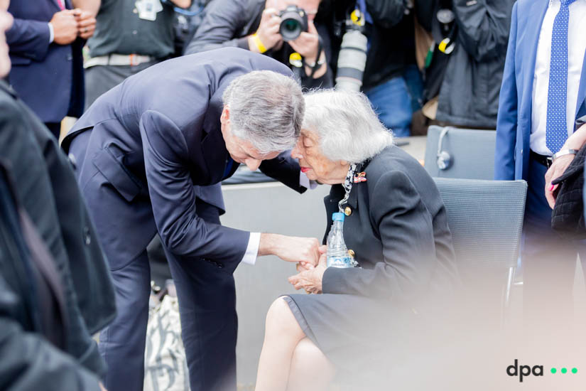 US Secretary of State Antony Blinken talks to Holocaust survivor Margot Friedlaender during an event for the launch of a closer U.S.-Germany dialogue on Holocaust issues at the Holocaust Memorial.