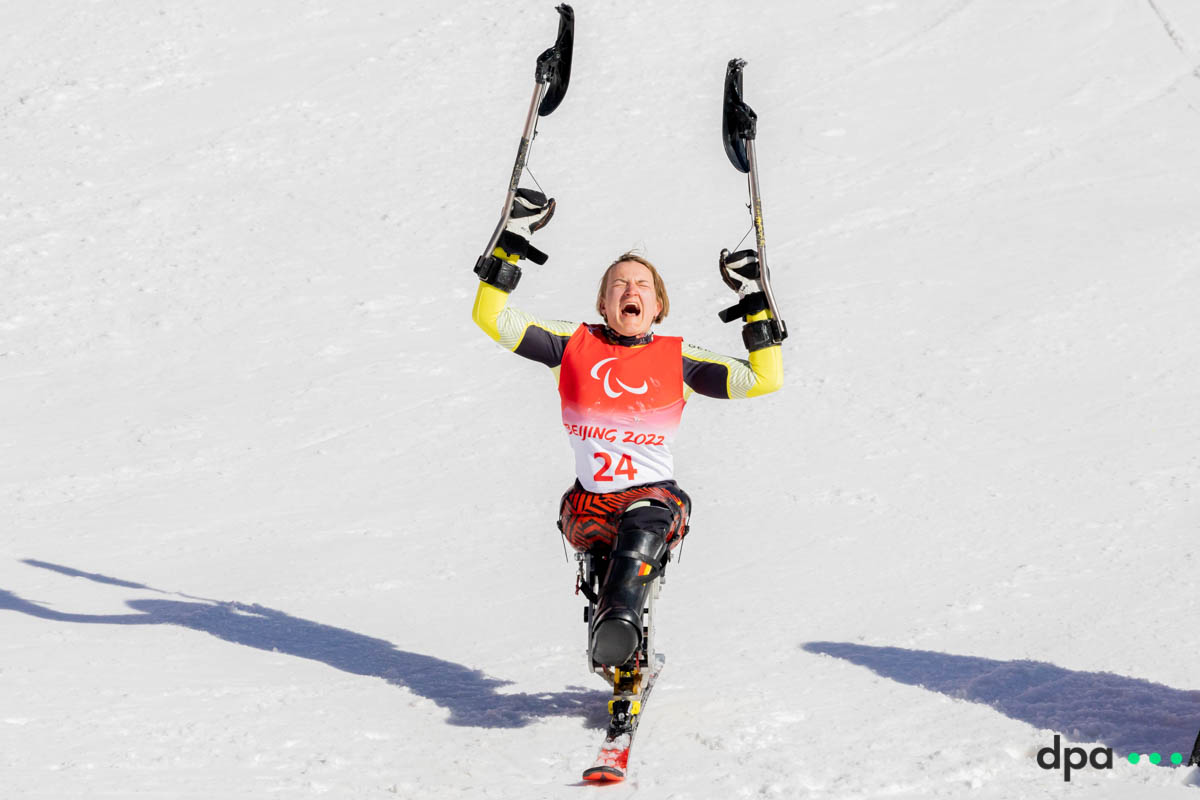 Anna-Lena Forster of Germany reacting to winning the women’s super combination, sitting.