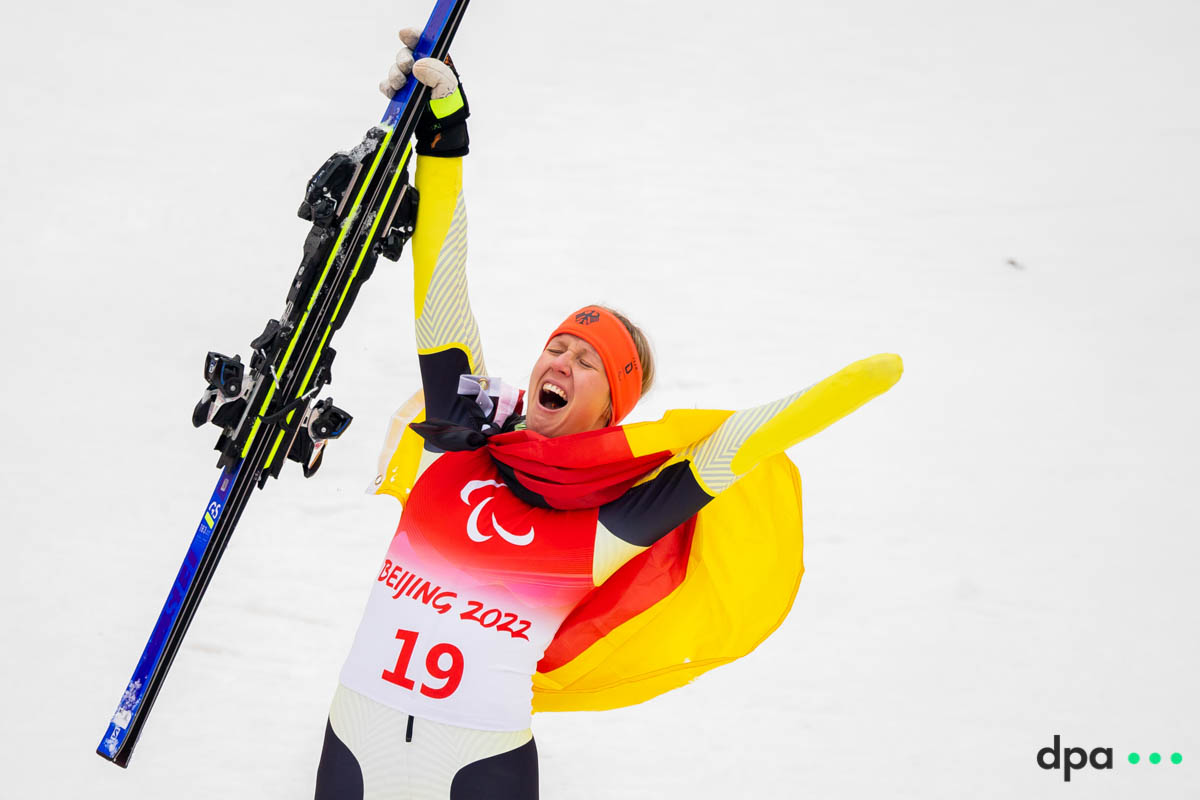 Andrea Rothfuss of Germany reacts to winning third place in the women’s giant slalom, standing.