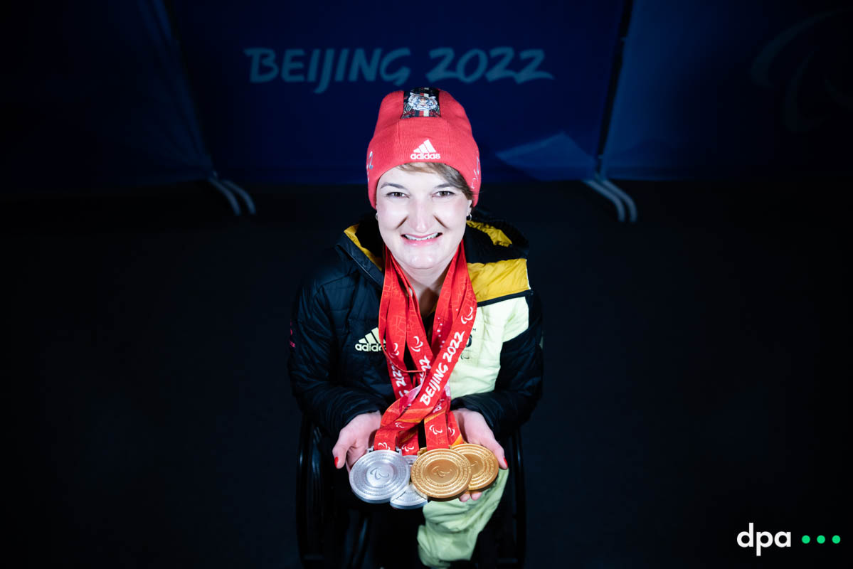 Anna-Lena Forster of Germany holds her medals.