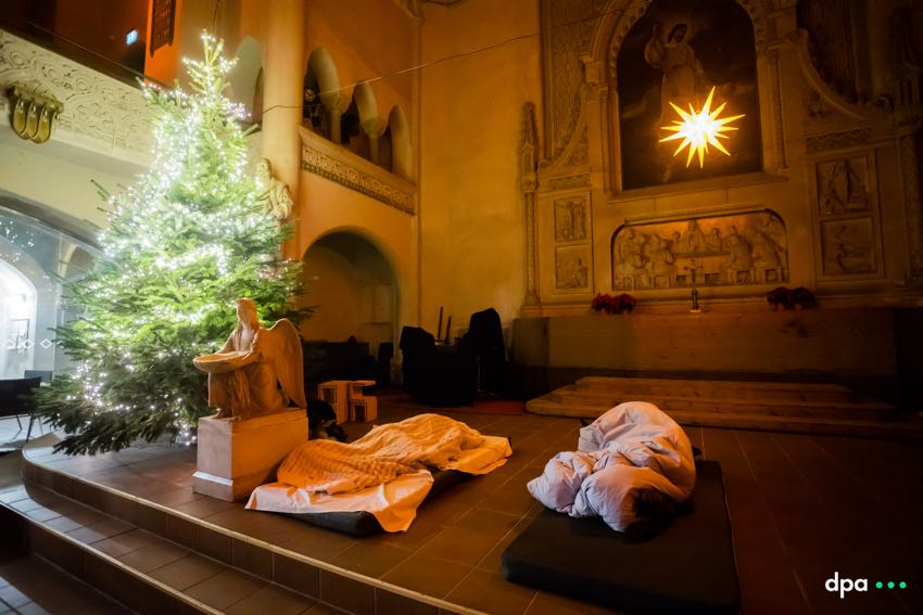 Homeless people sleep in the Zwingli Church. After a fire had broken out at an airdome used as accommodation for homeless people, the church is used as replacement shelter. 