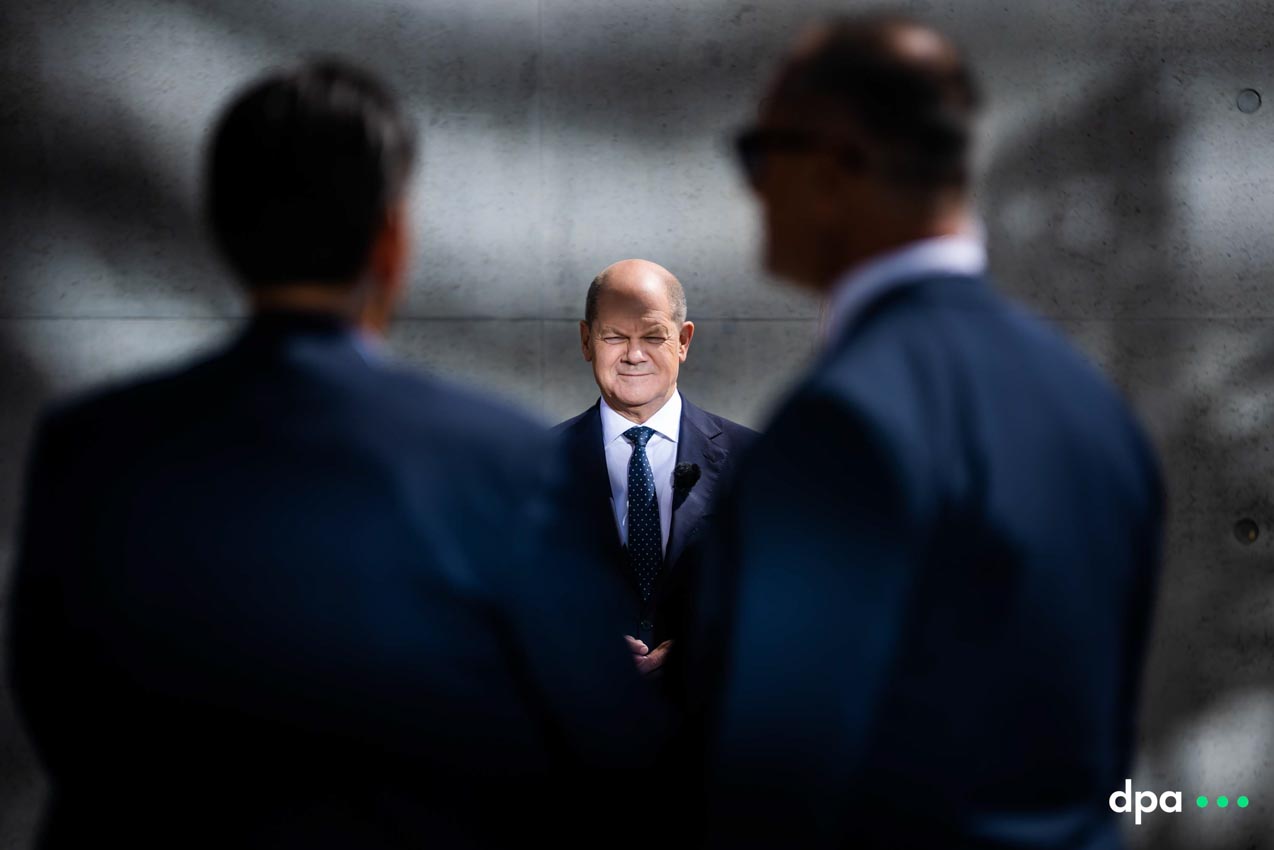 German Chancellor Olaf Scholz waits for a TV interview with German public broadcaster ARD to start.