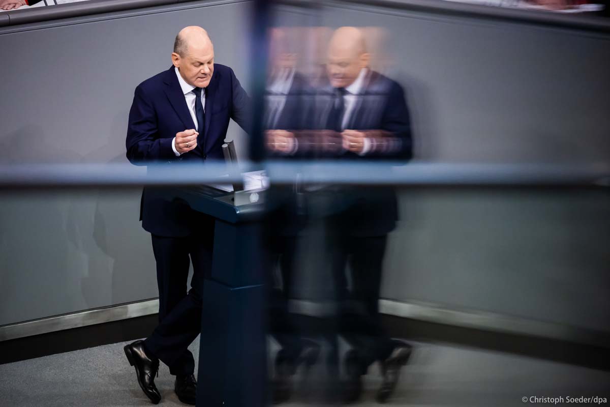German Chancellor Olaf Scholz (SPD) makes a government statement in the plenary session of the German Bundestag.